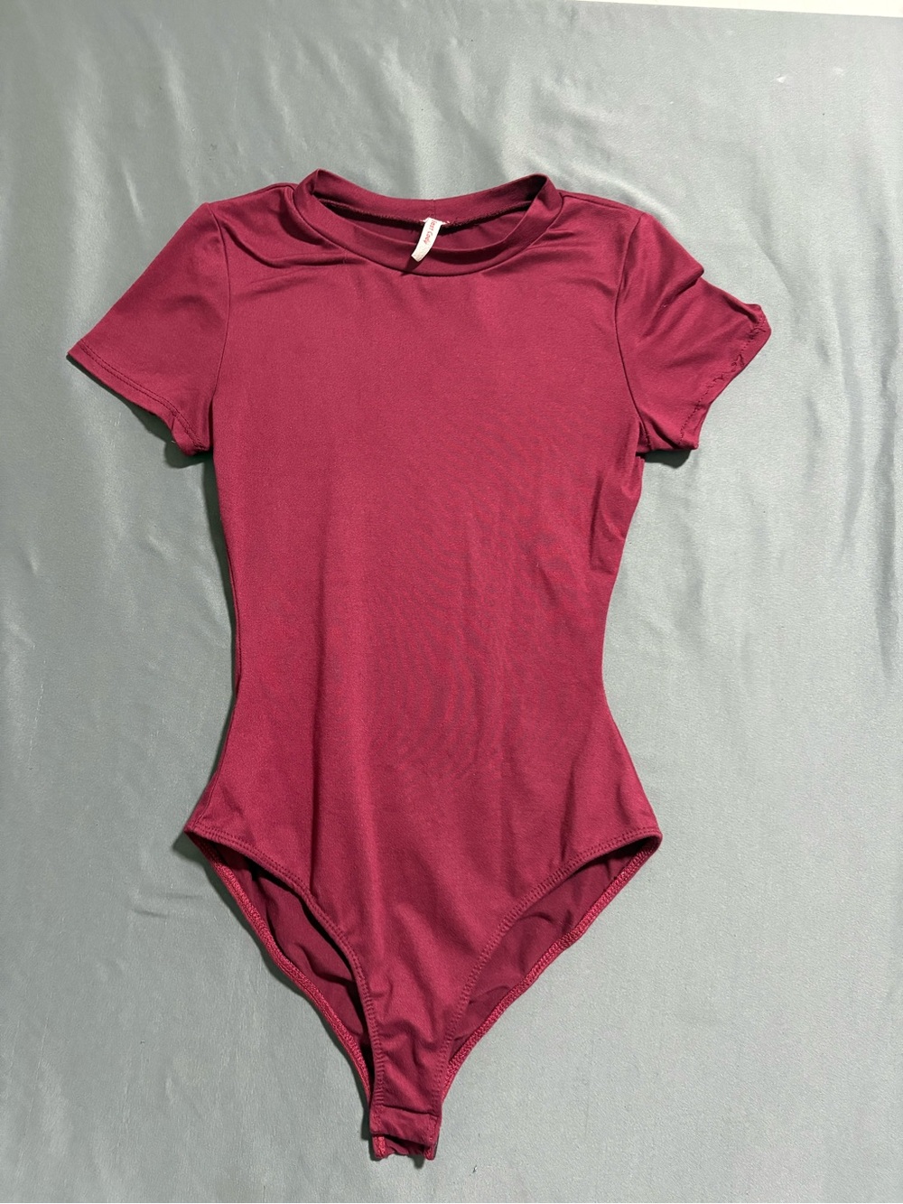 Teen Short Sleeve One-Piece Bodysuit in Deep Berry